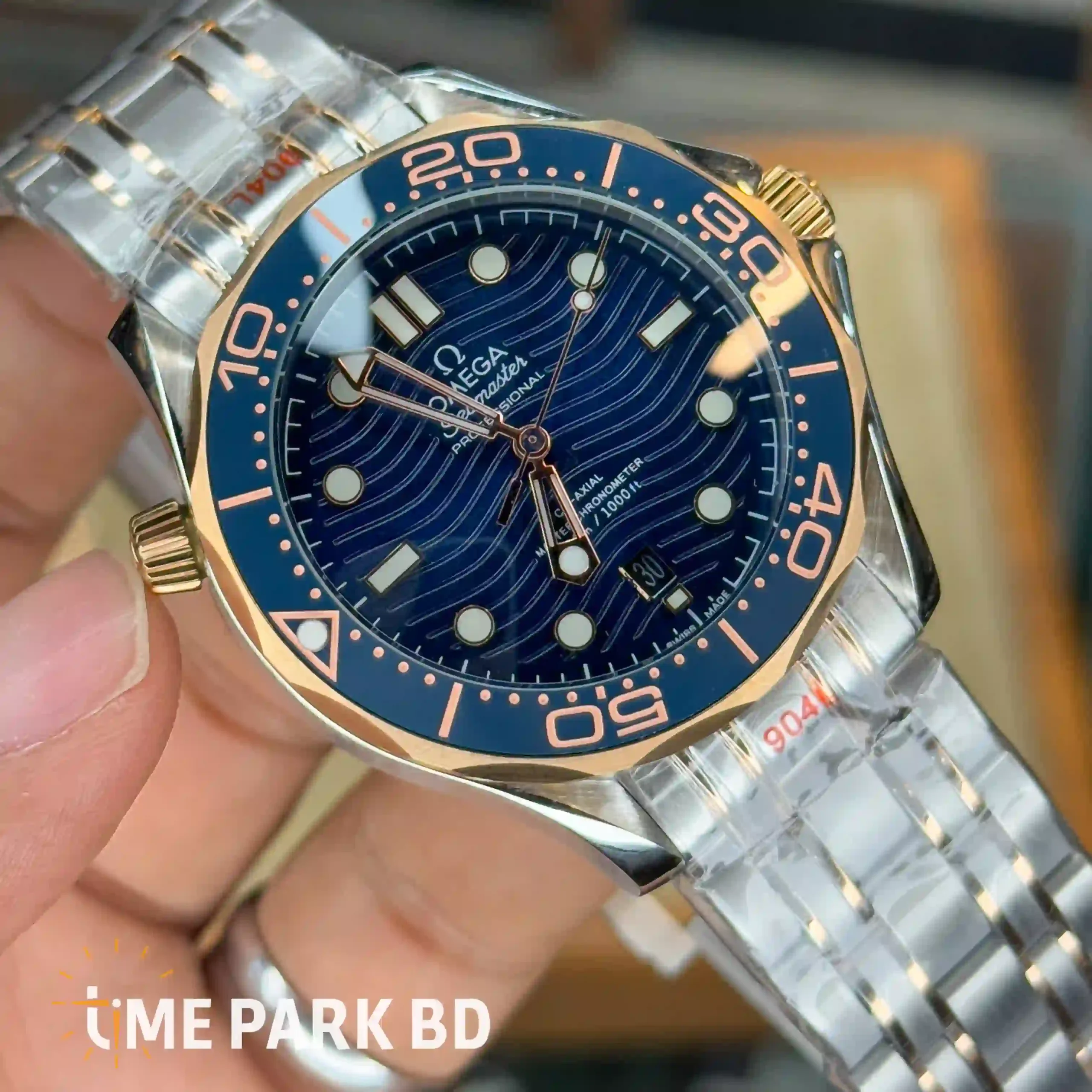 IMG_0732_result Omega — Blue Wave Dial, Gold-Accented Blue Bezel & Silver-Tone Bracelet - Image 3