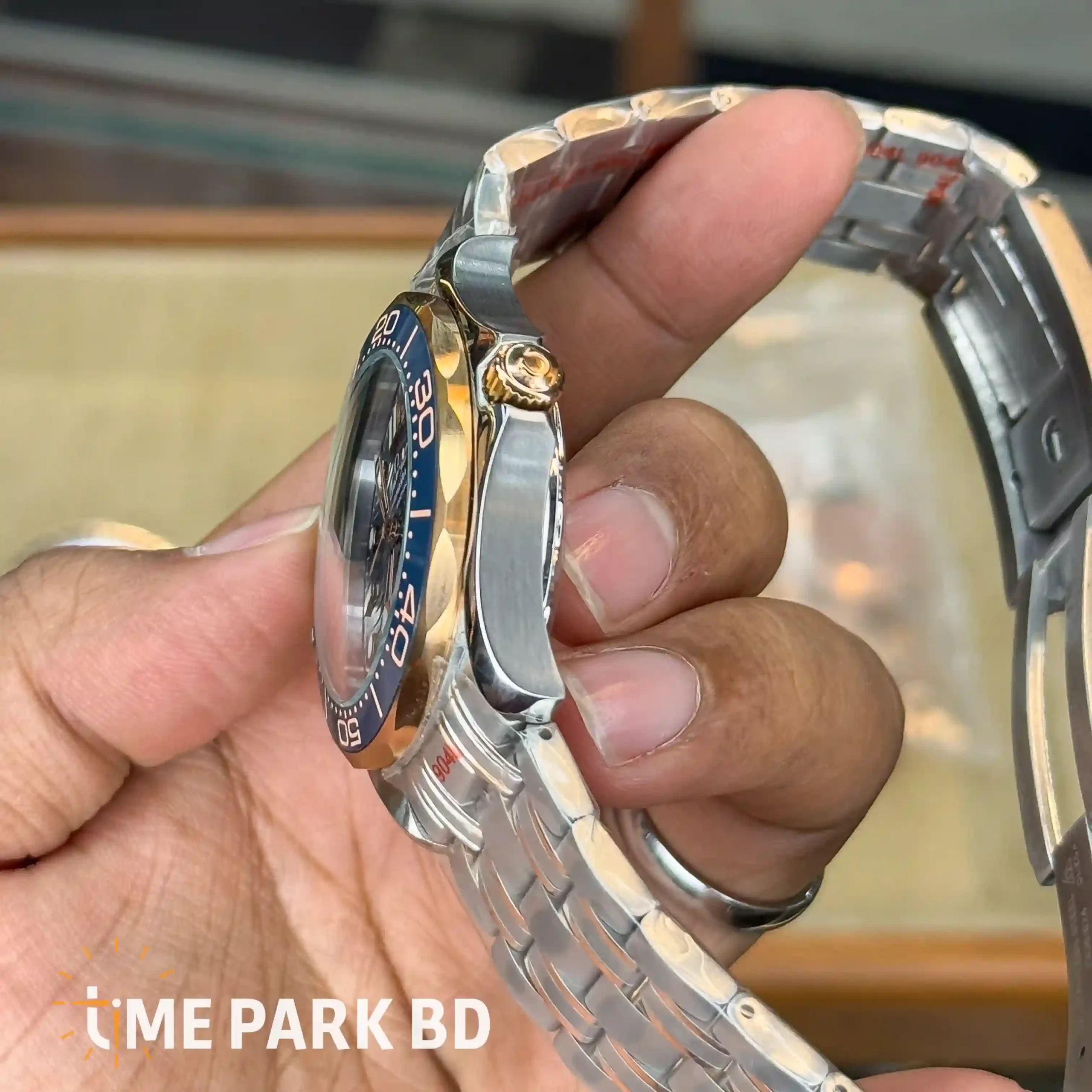IMG_0734_result Omega — Blue Wave Dial, Gold-Accented Blue Bezel & Silver-Tone Bracelet - Image 4