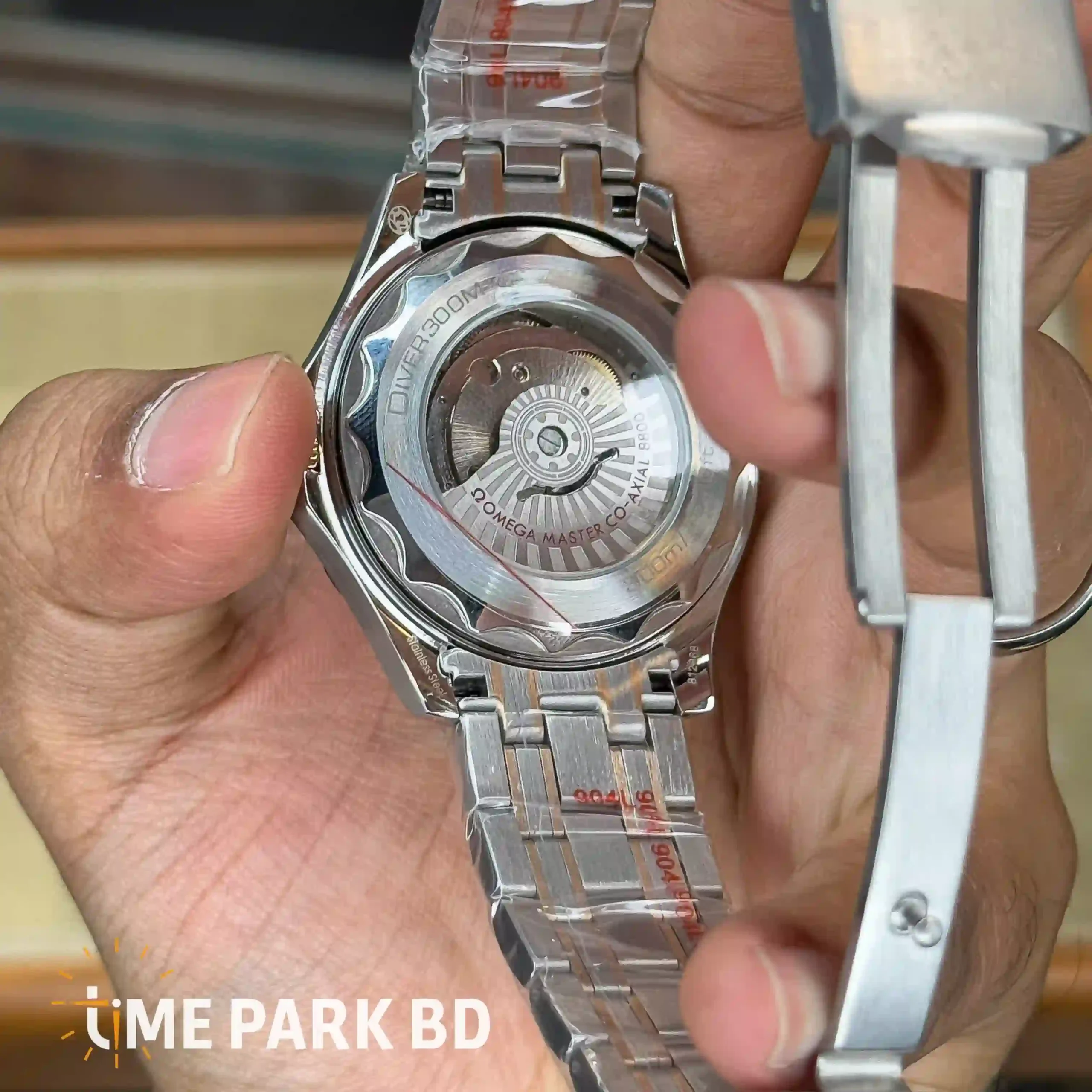IMG_0735_result Omega — Blue Wave Dial, Gold-Accented Blue Bezel & Silver-Tone Bracelet - Image 5