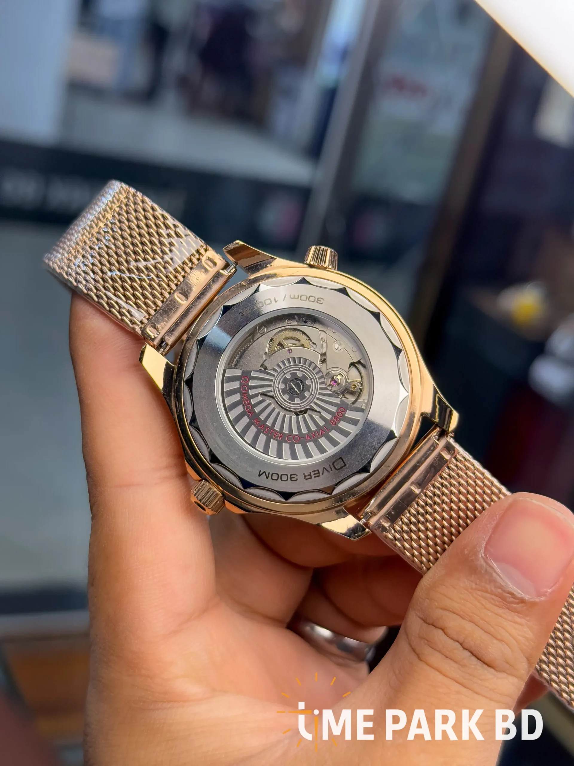 IMG_4769_result Omega — Black Dial, Red Bezel & Rose-Gold-Tone Mesh Bracelet - Image 4