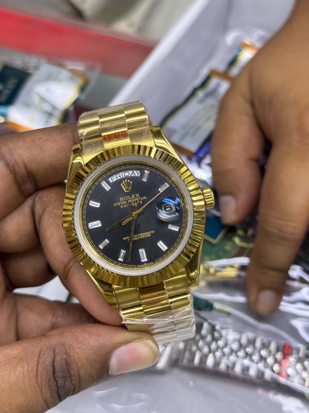 tp-b3-ref-20261023-02-rolex-dark-stone-baton-day-date-gold Rolex — Dark Dial, Stone-Style Baton Markers & Gold-Tone Day-Date Design — original reference photograph