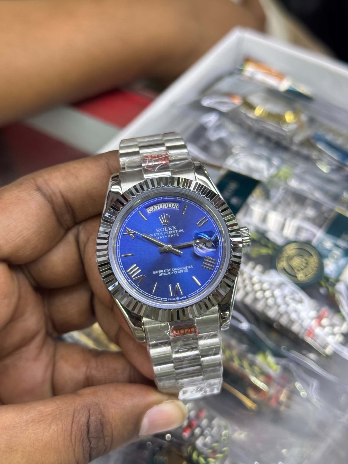 tp-b3-ref-20261023-03-rolex-blue-roman-day-date-silver Rolex — Blue Roman Dial & Silver-Tone Day-Date Design — original reference photograph